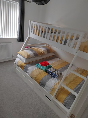 White wooden bunk bed with
